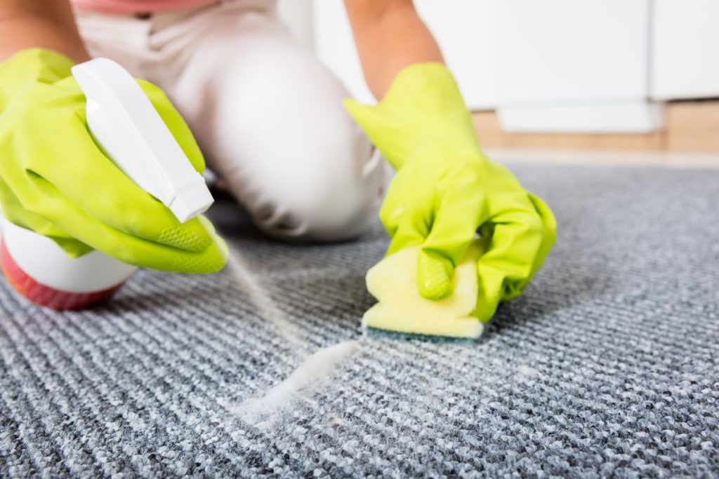 Clean the affected area with a stain remover