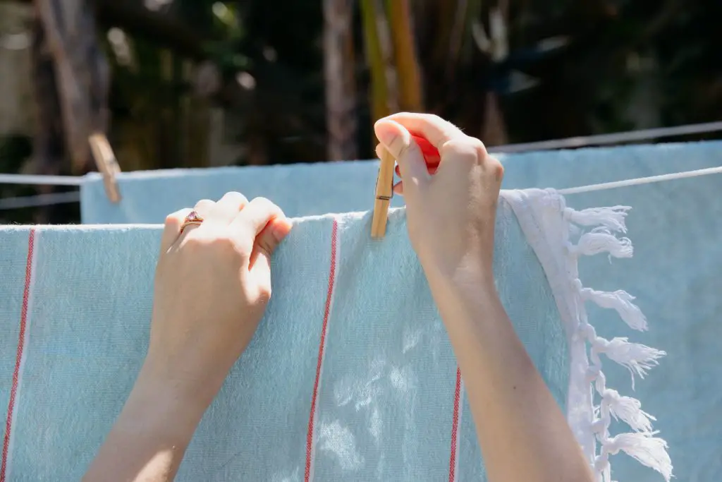 Dry in the direct sunlight by hanging out clothes