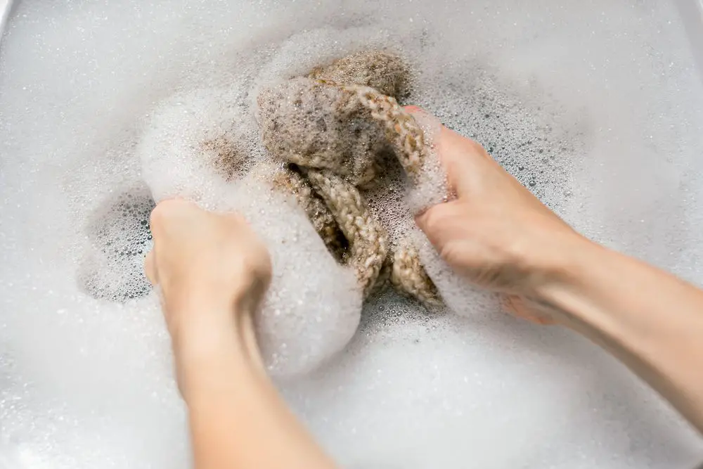 Soak the blanket in cold water for a few minutes How to Wash a Knitted Blanket