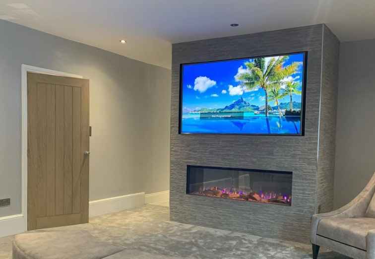 how to build a false wall for tv and fireplace