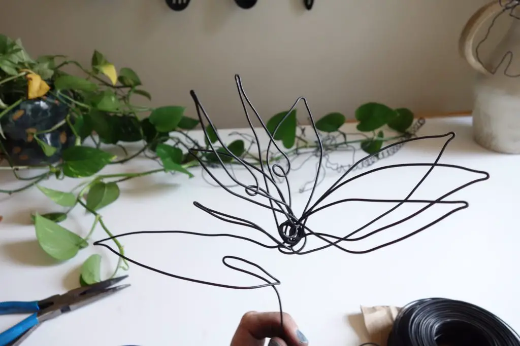 Plants or flowers can be used to cover exposed wires