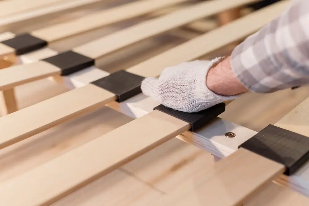Add some slats to Stabilize a Wobbly Wooden Bed Frame