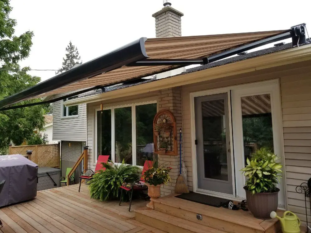 Mount a retractable awning: How To Stop Rain Water From Entering Your Balcony