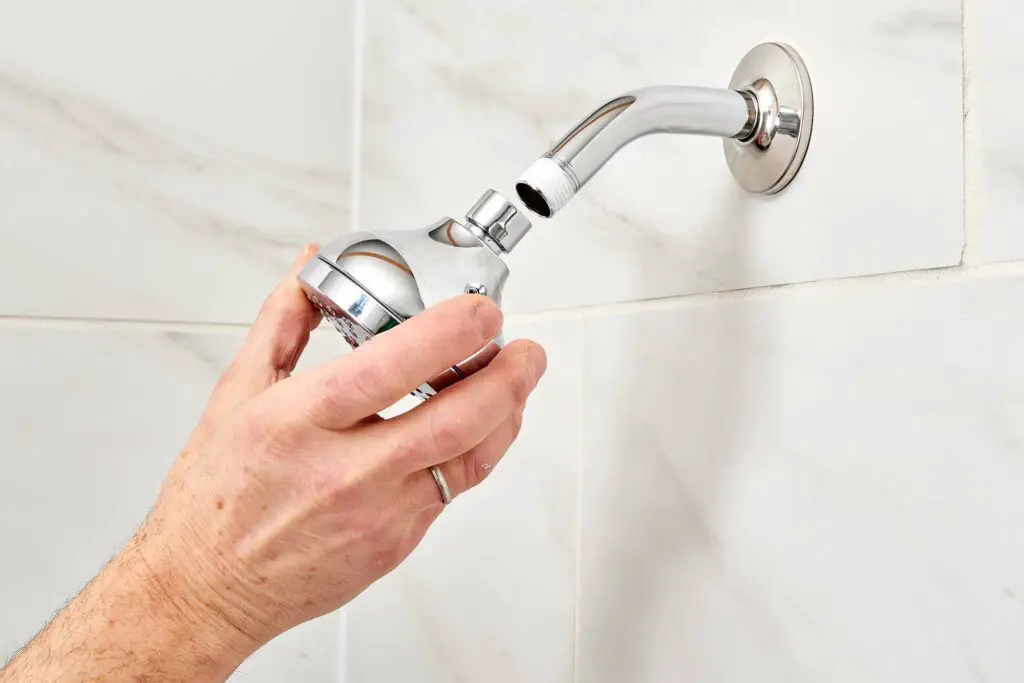 Change the showerhead's settings